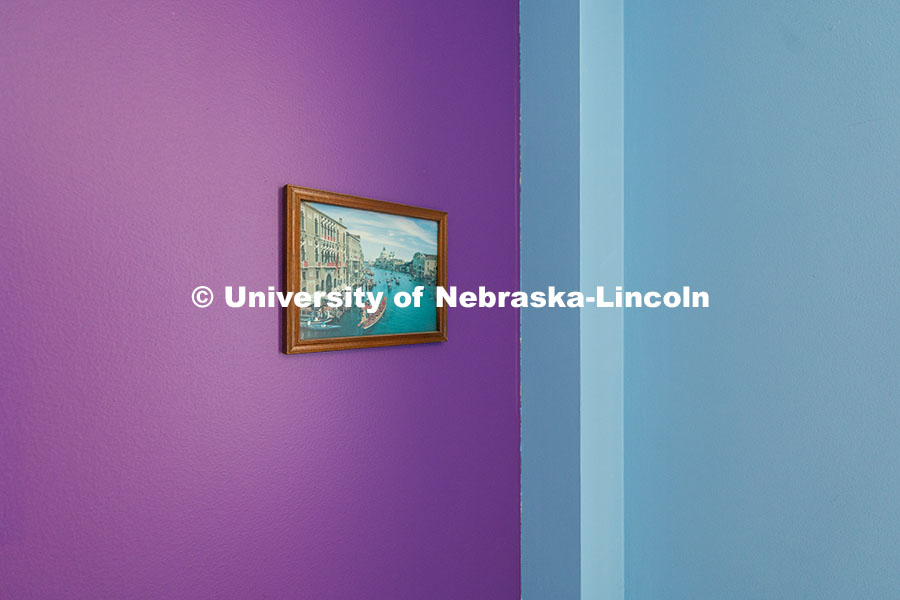 A picture of Venice is the only item remaining in a colorful former faculty office on the second flo