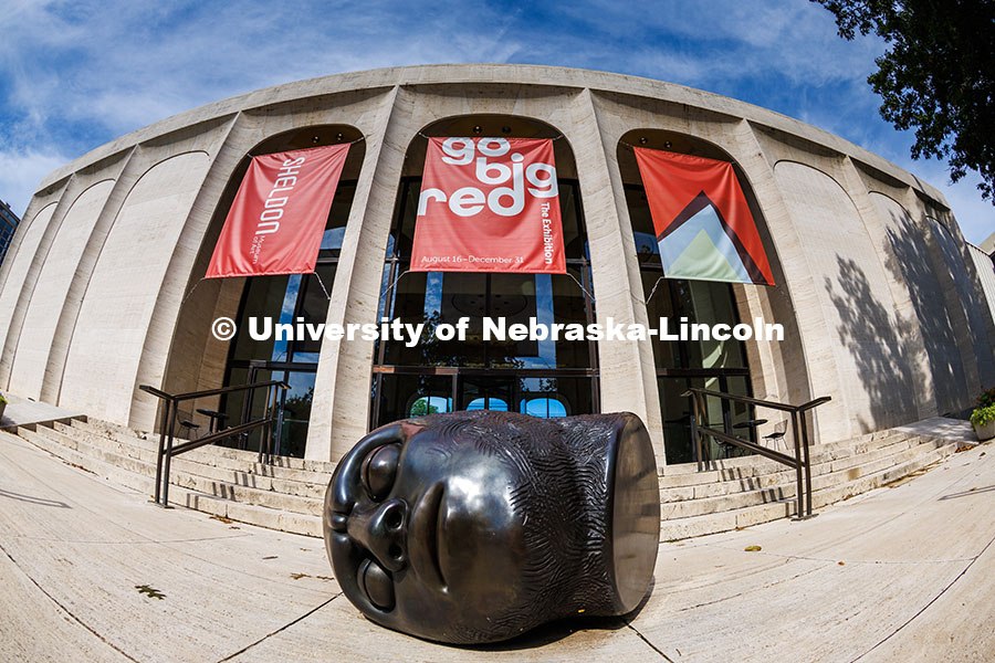 250812_Campus_082.jpg Signs hanging outside the Sheldon Memorial Art Gallery for the Go Big Red Exhibition. Summer on City