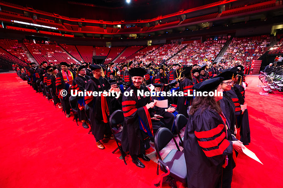 250816_Commencement_3661.jpg Vinicius Andrade looks toward his family in the audience at Pinnacle Bank Arena. Andrade received hi
