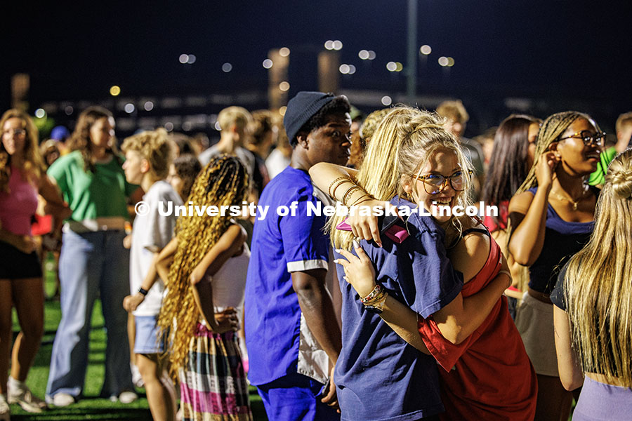 250821_Playfair_811.jpg Students hug each other as they meet up during Playfair. More than a thousand students gather on the