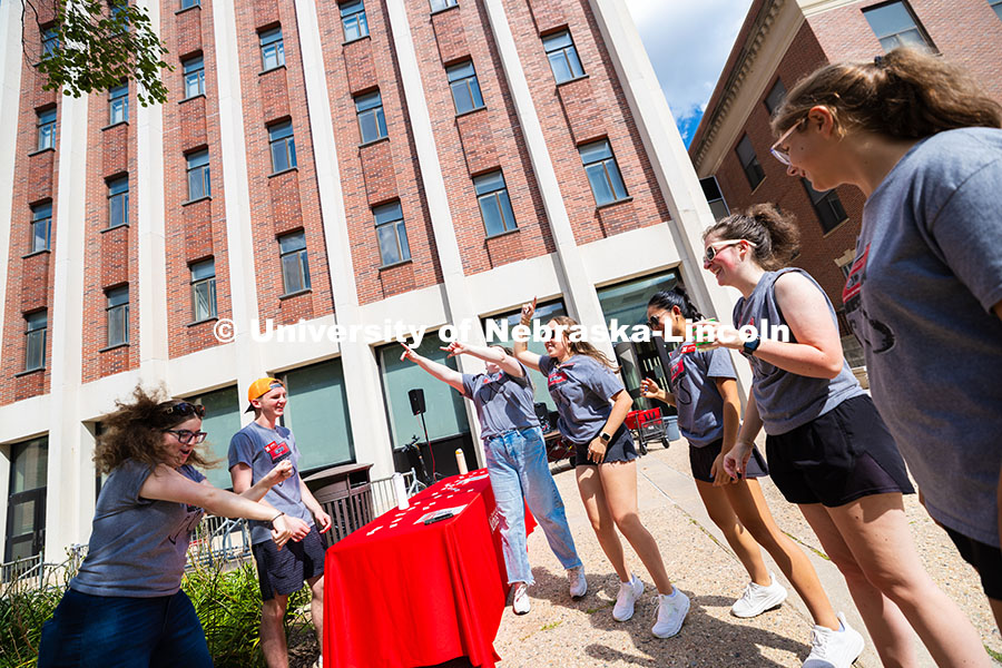 250821_Welcome_Parties_4112.jpg Student Ambassadors jam to music outside of Oldfather Hall during the College of Arts and Sciences w