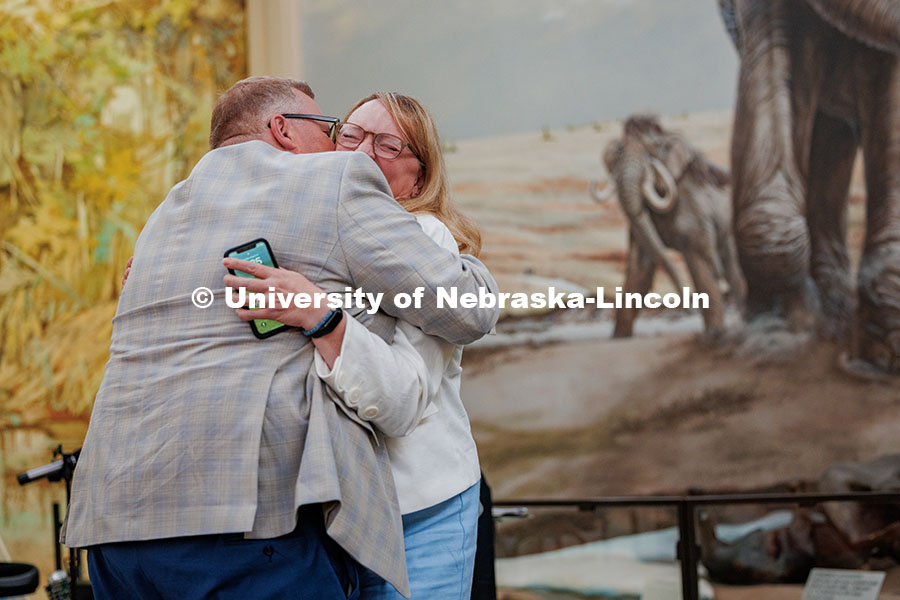250821_Zeleny_Farewell_518.jpg Mike Zeleny hugs his wife, Amy Zeleny, during his farewell reception in Morrill Hall. August 21, 202