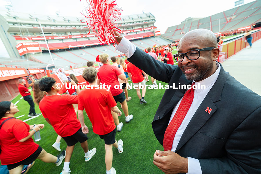 250822_Tunnel_Walk_4214.jpg Chancellor Rodney Bennett waves a pom-pom to cheer on first-year students entering Memorial Stadium
