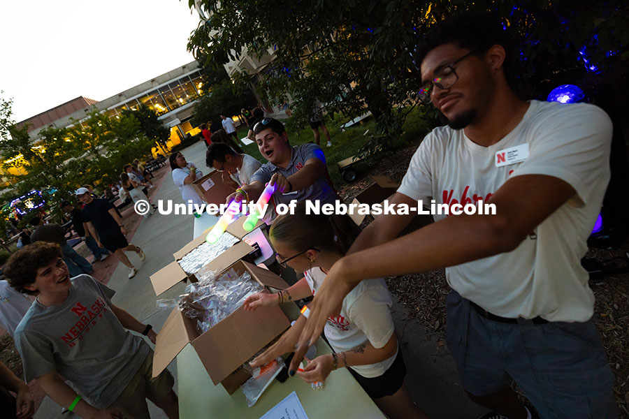 250818_Block_Party_3901.jpg Gavin Moore (right to left), Haylie Hoatson and Nicholas Mele dance to music during the Harper Schra