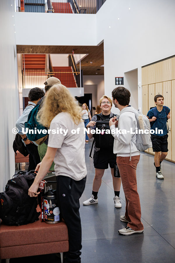Senior Education Majors, Willa Sharp (left) and Evan Mott, chat in the main hallway of the new Fine 