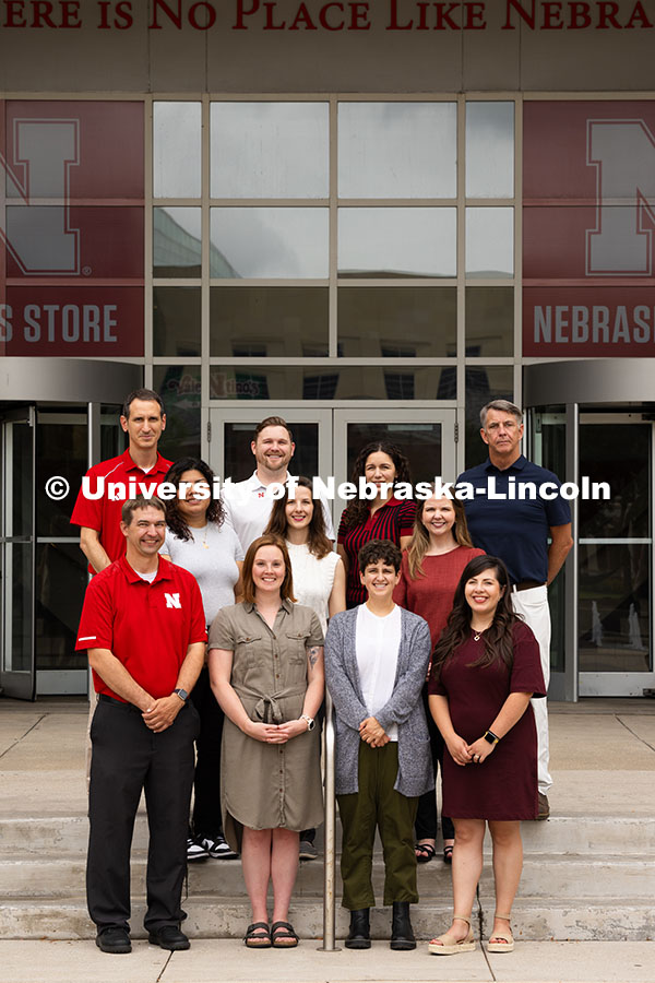 250624_Navigators_1256.jpg Group portrait of the Academic Navigators outside of the Nebraska Union. First row, l-r: Eric Einspa