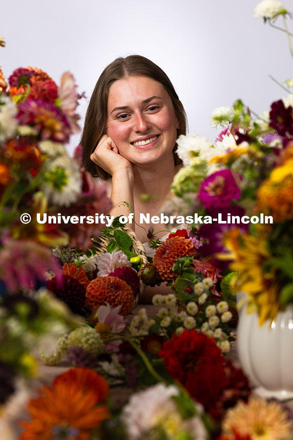 250905_Albro_6722.jpg Studio portrait of Laura Albro, Engler Agribusiness Entrepreneur, with cut flowers and arrangements
