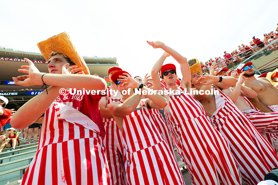 250913_NU_vs_HCU_7495.jpg Friends and student section hype leaders Toby Ekdale, Dominic Dicarlo, Tom Dey and Landen Oppliger c