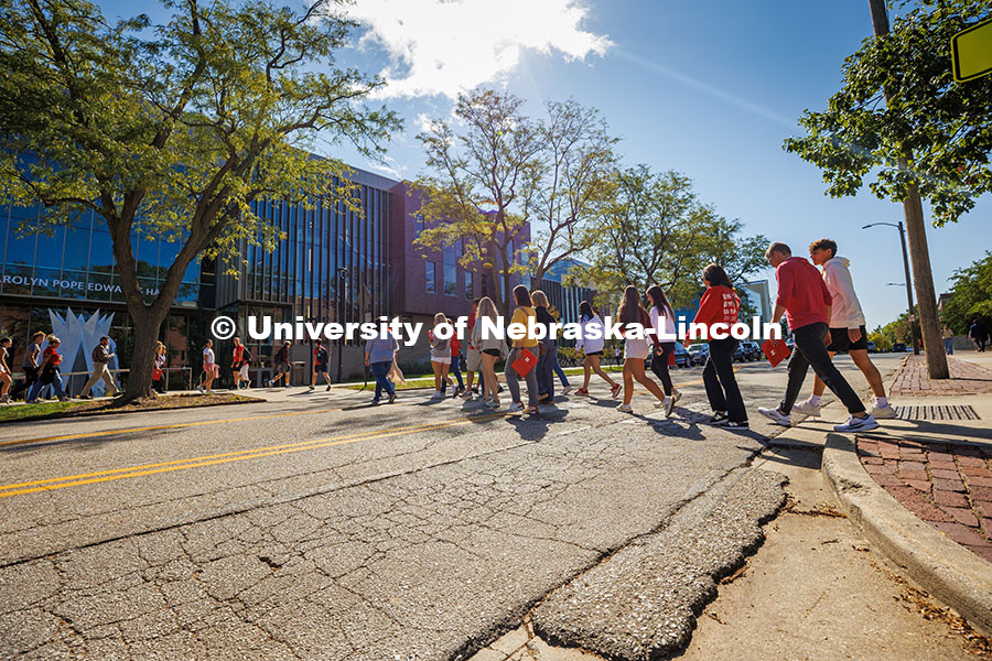 250919_Red_Letter_Day_569.jpg A tour group crosses the street toward Caroline Pope Edwards Hall during Red Letter Day. September 1