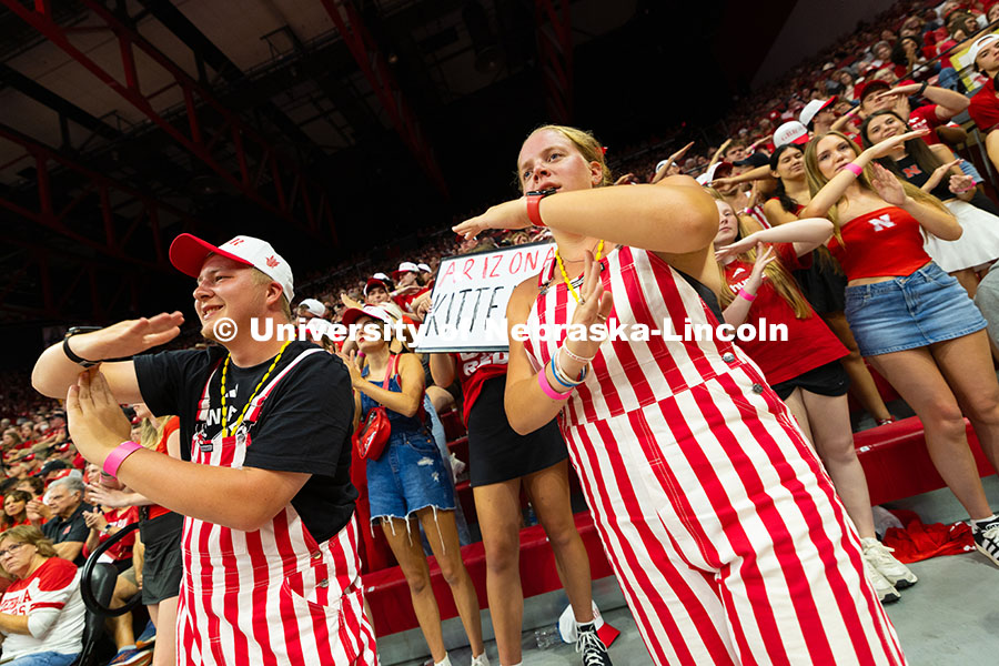 Jacob Gill and Makenna Zimmerman, both sophomores studying secondary education, are wearing striped 