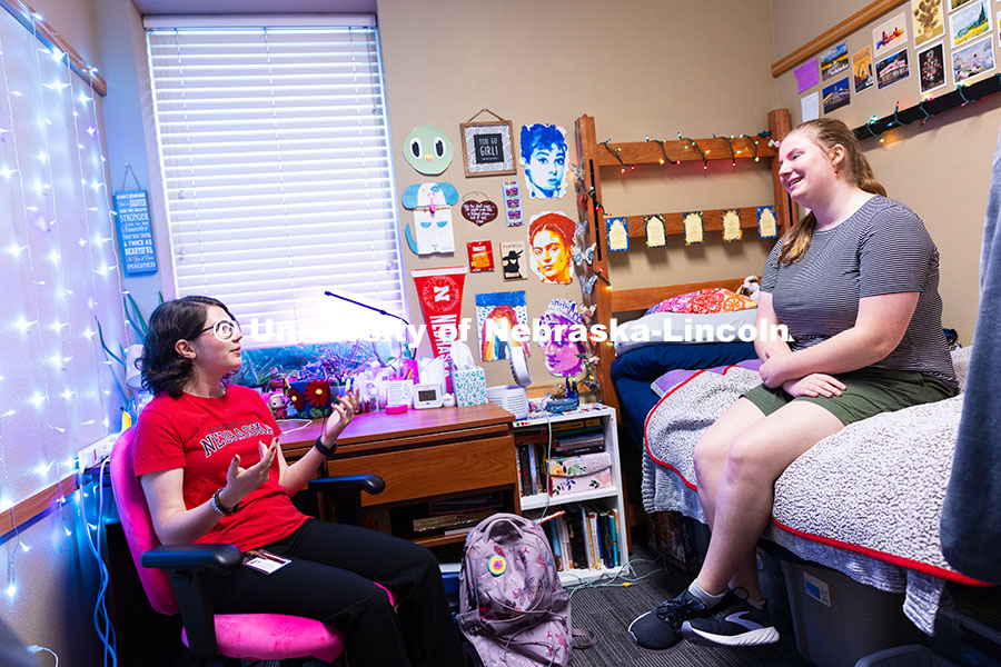 Bianca Iannetta (left), a junior in the Honors Program, talks to Kathryn Koehler, also a junior, in 