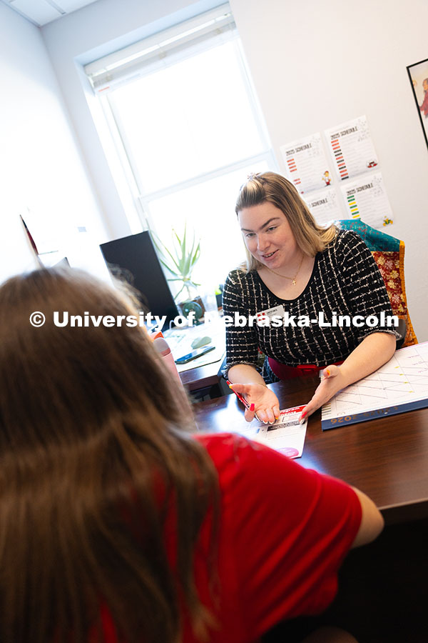 Sawyer Smith, Honors Program Coordinator, chats with Maddy Coty, a sophomore in the program. Septemb