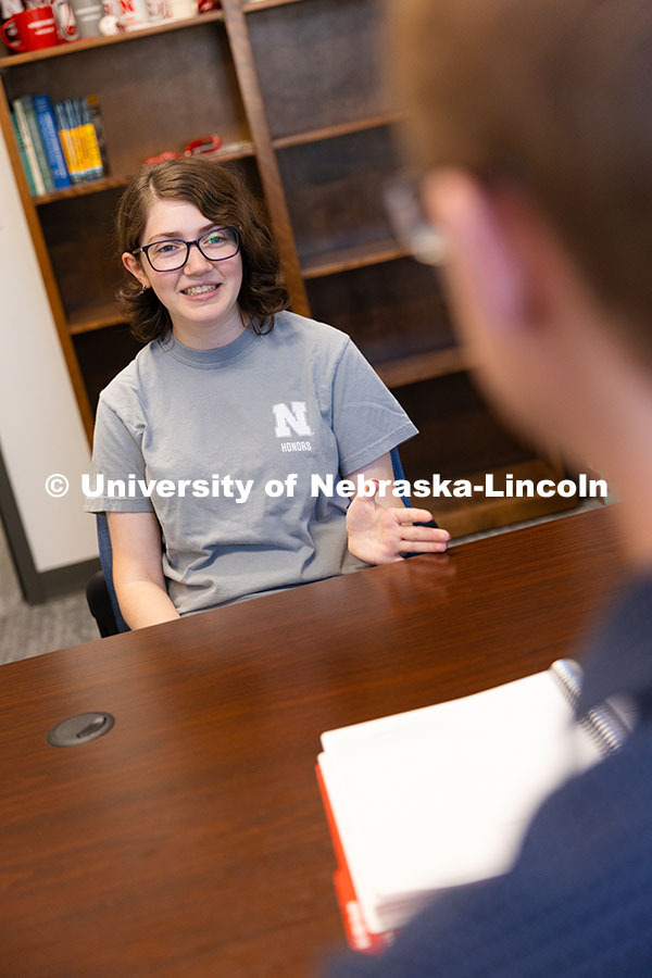 250922_Honors_Program_8595.jpg Nick Gilbert, Honors Program Assistant Director, chats with Bianca Iannetta, a junior in the program