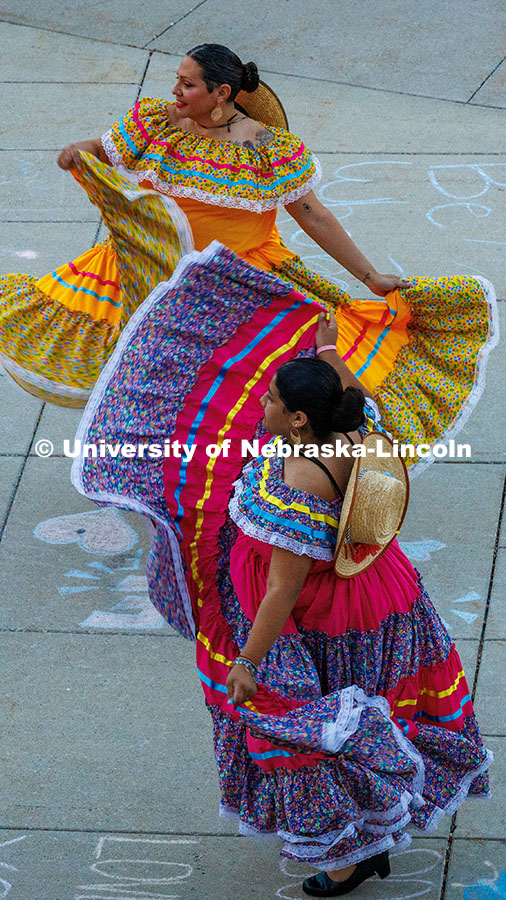 250926_Fiesta_on_the_Green_1198.jpg Dancers from the Sangre Azteca Dance Group perform a folkloric dance for attendees of the Fiesta on