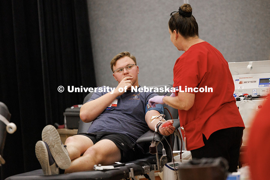 Benjamin Arens, sophomore mechanical engineering major, gives blood during the 2025 Homecoming Blood