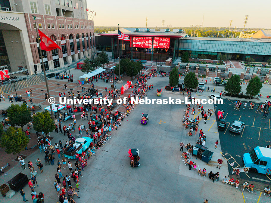 251003_Cornstock_03.jpg Aerial view of the Husker community as they watch floats go by in the east stadium loup drive during