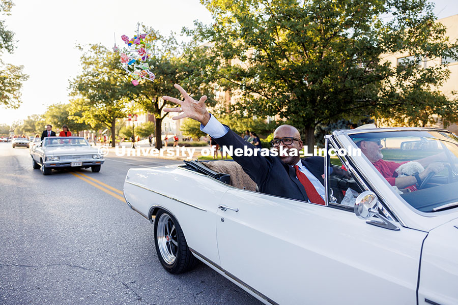 251003_Homecoming_Parade_05.jpg Chancellor Rodney Bennett tosses out candy from a vintage car during the homecoming parade. 2025 Hom
