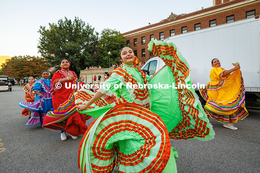 251003_Homecoming_Parade_314.jpg A member of the Sangre Azteca Dance Group passes by in the Homecoming 2025 parade. Homecoming parade