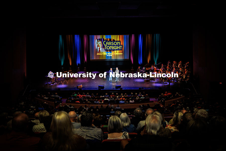 251023_Carson_100_001.jpg Magician Mike Caveney, right, preforms inside the Lied Center. Johnny Carson’s 100th Birthday Cele