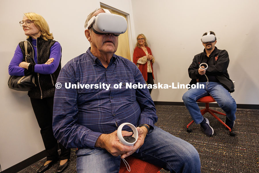 251024_Carson_Tours_006.jpg Jeff Sotzing (center-left), and Larry Witzer (right), both members of the Johnny Carson Foundation,