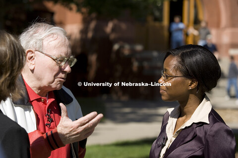 UNL alumnus Warren Buffett talks with Microsoft Corp. founder Bill Gates outside the Lied Center for