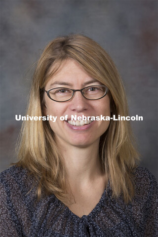 Studio portrait of Heather Richards-Rissetto, Assistant Professor, Anthropology. August 20, 2014. 