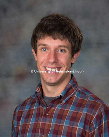 Studio portrait of Alexander Zupan, New Faculty Photo Shoot, August 19, 2015. 