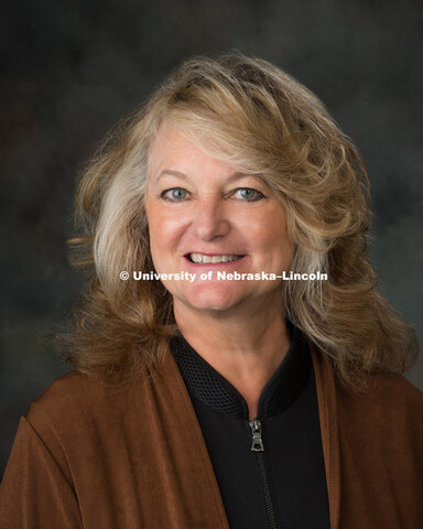 Studio portrait of Gail Miller, University Affairs, October 17, 2015. 