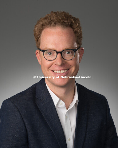 Studio portrait of Andrew Jewell, Library faculty/staff photo for web. May 4, 2016. 