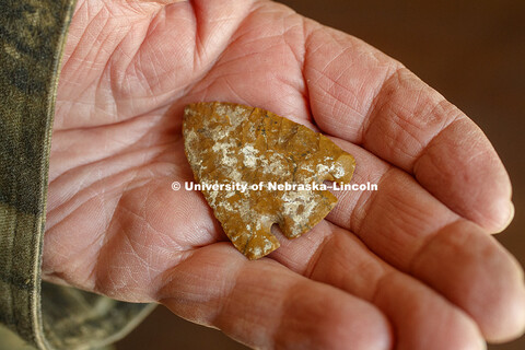 Robert Coble holds a Wray Point. Artifacts Road Show put on by UNL Professor Matt Douglass and the U