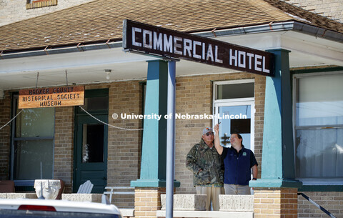 On the porch of Mullen's Commercial Hotel which now houses the Hooker County Historical Society, Den