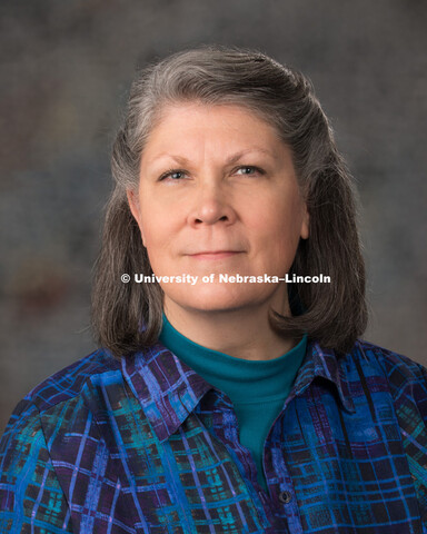 Studio portrait of Tracy Aksamit, Central Administration. January 19, 2017. 