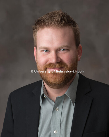 Studio portrait of Aaron Engelman, classroom tech support, College of Engineering. June 1, 2017. 