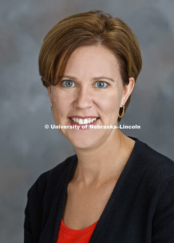 Studio portrait of Ambassador Darci Vetter, former chief agricultural negotiator at the Office of th