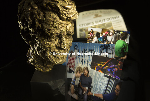 The RFK trophy sits amongst photographs and a newspaper headline showing the outcome of their report