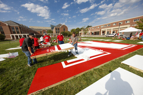 Husker Flag made of mega blocks being assembled on green space by Nebraska Union. August 31, 2018.  