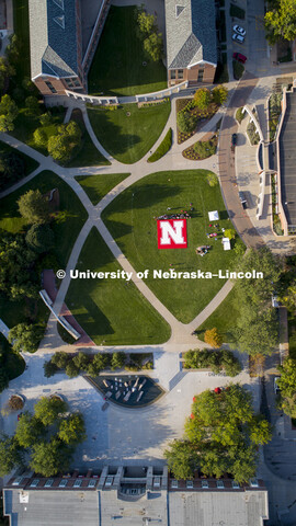 Husker Flag made of mega blocks being assembled on green space by Nebraska Union. August 31, 2018.  