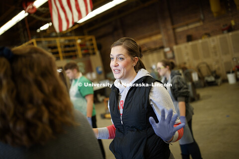 Toni Rasmussen, agriculture education teacher at Wayne High School, works with her class as they dis