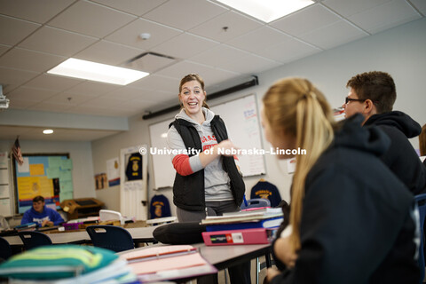 Toni Rasmussen, agriculture education teacher at Wayne High School, works with her Ag Leadership and