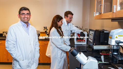 Ali Tamayol (left), Assistant Professor of Engineering, with doctoral students Azadeh Mostafavi (cen