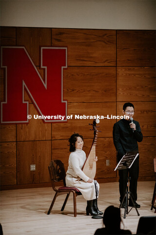 Our Nebraska: Express Yourself Expo in the Oasis Center. Chinese students playing traditional string