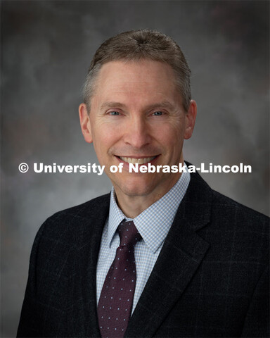 Studio portrait of Steven Booton, University Registrar. March 28, 2019. 