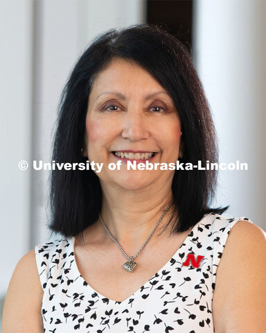 Studio portrait of Annette Contreras, Office Supervisor at CAPS (Counseling and Psychological Servic