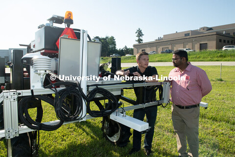 Grad student Josh Murman is with Santosh Pitla, associate professor of advanced machinery systems in