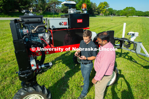 Grad student Josh Murman is with Santosh Pitla, associate professor of advanced machinery systems in