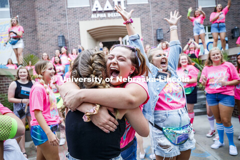 Alpha Delta Pi members celebrate outside their sorority. Sorority Bid Day. August 24, 2019. 