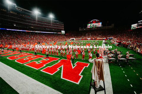 Cornhusker Marching Band playing to student section. Nebraska vs. Northern Illinois football game. S