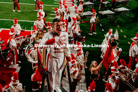 Ethan Millington Chants "Go Big Red" as the band completes their show. Nebraska vs. Northern Illinoi