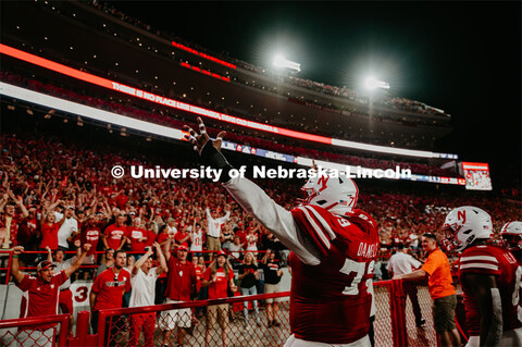 Darrion Daniels celebrates with crowd at the Nebraska vs. Northern Illinois football game. September