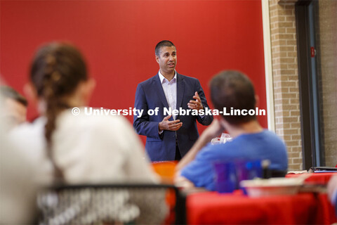 Ajit Pai, chairman of the Federal Communications Commission, talks at a luncheon at the law school. 